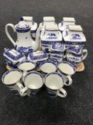 A tray of seventeen pieces of Ringtons willow pattern china - teapots, vases,