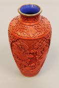 A Chinese cinnabar lacquer vase CONDITION REPORT: Height 20.5cm.