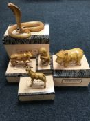 Five boxed wooden African plains animal figures