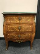 A continental inlaid walnut bombe three drawer ormolu mounted chest,