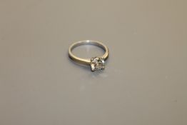A platinum diamond solitaire ring, approximately 0.72ct, size H.