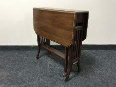 A Victorian inlaid mahogany Sutherland table