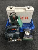A basket of Black & Decker jigsaw, two sanders,