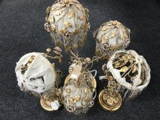 An ornate brass three way lamp and pair of matching table lamps