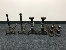 Three sets of early 20th century fire dogs