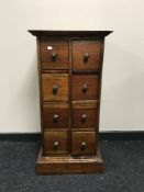 An Indonesian hardwood eight drawer chest