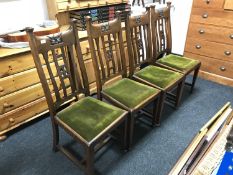 A set of four mahogany Arts & Crafts dining chairs