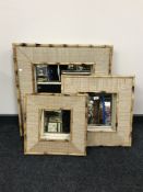 Three square graduated bamboo framed mirrors