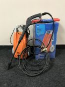 A boxed B & Q electric pressure washer