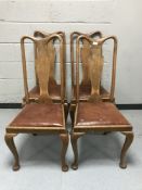 Four oak dining chairs