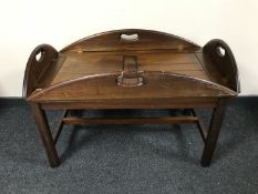 A large mahogany butler's tray on stand