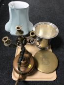 A tray of plated table lamp base with shade, plated ice bucket with lion mask handles,