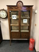 An Edwardian and later inlaid mahogany bookcase,