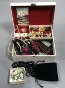 A box of assorted costume jewellery - necklaces,