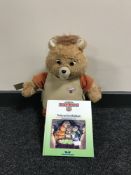 A vintage Teddy Rukspin bear with accompanying book and cassette tape CONDITION REPORT: