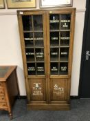 An early 20th century and later oak glazed bookcase,