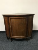 A mahogany corner cabinet