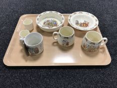 A tray containing seven pieces of Royal Doulton Bunnykins china,