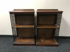 A Victorian inlaid mahogany revolving bookcase converted into two sets of shelves