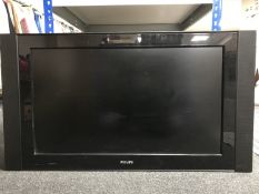 A Philips 42 inch plasma TV with remote (no table stand)