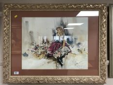 After Gordon King : A lady by a basket of flowers, colour print, framed.