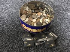 A tin of pre decimal British coins,