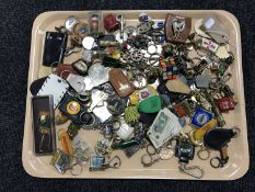 A tray of late twentieth century key rings