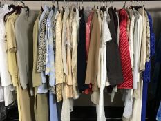 A rail of lady's designer clothing with makes including Frank Usher, Alexon, Jaeger,