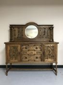 An oak barley twist mirror backed sideboard