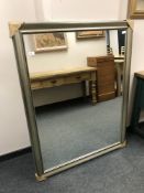 A contemporary framed mirror,