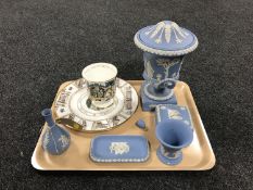 Five pieces of Wedgwood blue and white jasper ware including lidded vase (finial damage),