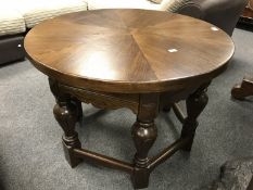 An early 20th century oak coffee table,