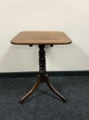 A late 19th century mahogany tripod table