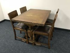A mid 20th century pull out table and four panel back chairs CONDITION REPORT: The