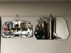 Two frameless bevelled mirrors