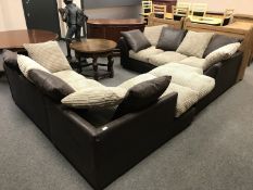 A pair of L-shaped corner settees in two tone fabric with scatter cushions.