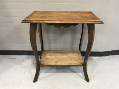 An Edwardian oak occasional table