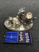 A four piece plated tea service on gallery tray together with a miniature plated barrel,