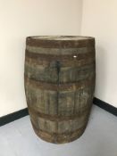 A coopered oak whiskey barrel