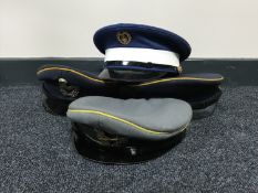 A box of four military caps