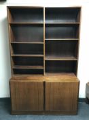 A set of late 20th century rosewood open shelves
