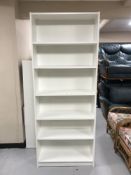 A set of white Ikea open shelves