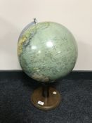 A terrestrial globe fitted a compass CONDITION REPORT: This is 52cm high and is
