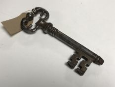 A novelty cork screw and bottle opener in the form of a key