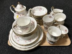 A tray of forty pieces of Paragon Victoriana rose tea and dinner ware