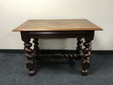 A mahogany library table on barley twist legs