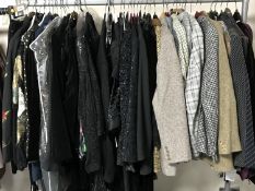 A rail of lady's designer clothing with makes including Gina Bacconi, Frank Usher, Vera Mont,