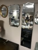 Two frameless bevelled mirrors together with an oval gilt framed mirror