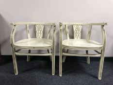 A pair of continental painted armchairs, width 57 cm.