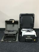 A cased vintage Underwood Leader typewriter together with a cased Olympia typewriter